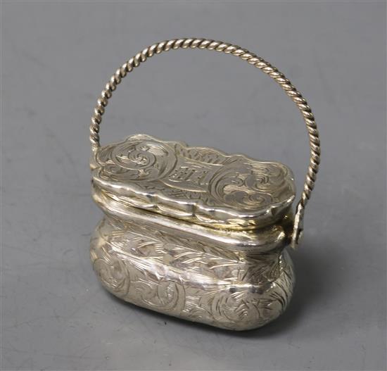 A Victorian novelty silver vinaigrette, modelled as a handbag, Frederick Marson, Birmingham, 1847, overall 43mm.